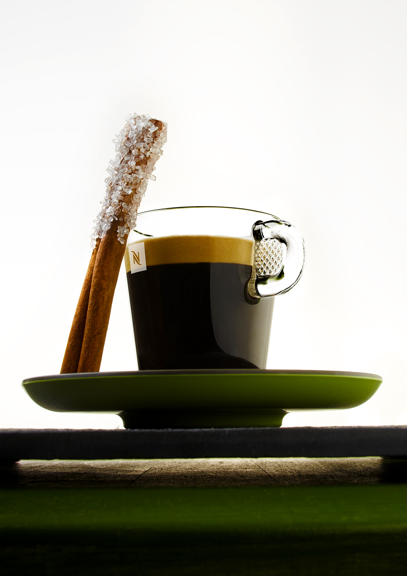 Espresso-With-Cinnamon-Stick-On-Green